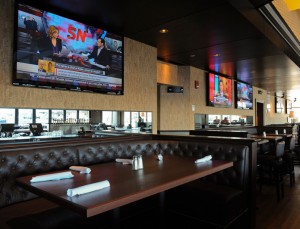 bar with large tv mounted