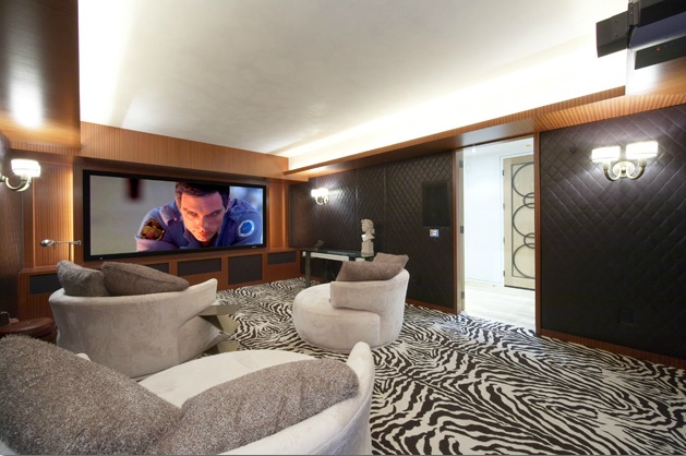 custom home theater with a zebra rug